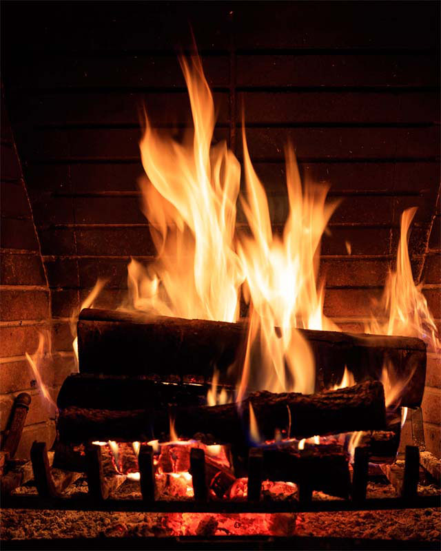 Top Hat & Tails Chimney - M Stock image of a fireplace fire