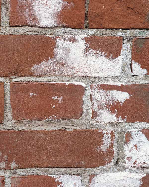 Top Hat & Tails Chimney Stock image of efflorescence Efflorescence on bricks